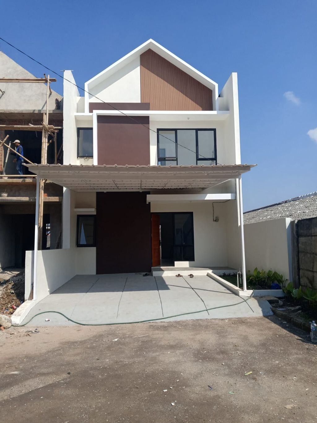 foto tampak rumah tipe 76/139 perumahan KEBUN RAYA RESIDENCE