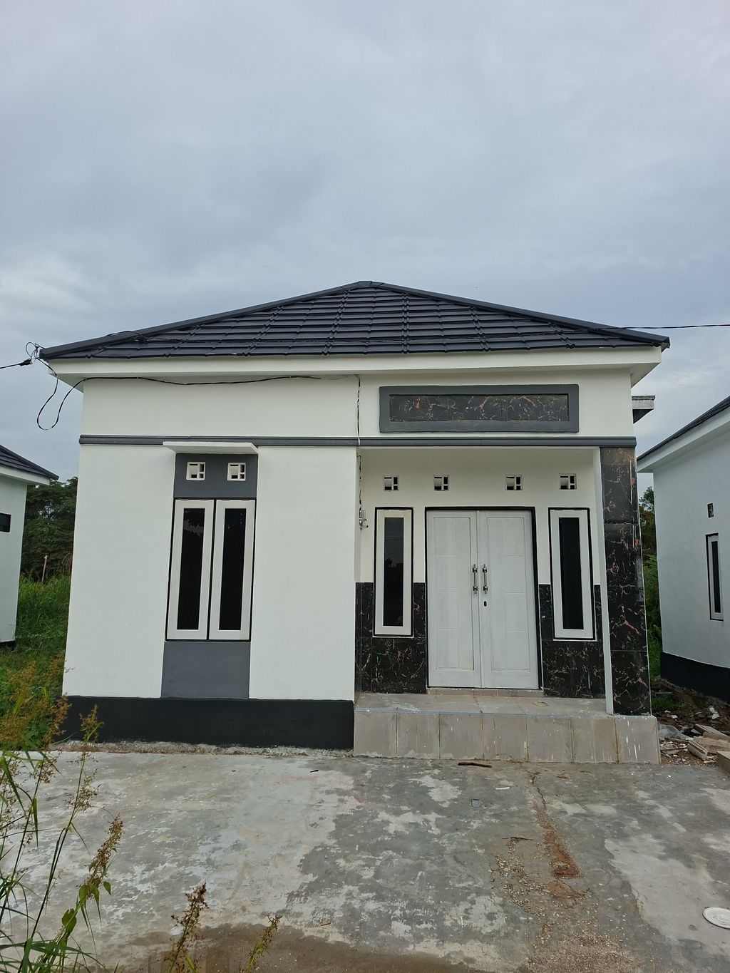 foto contoh rumah perumahan ARYA GRIYA WMP18